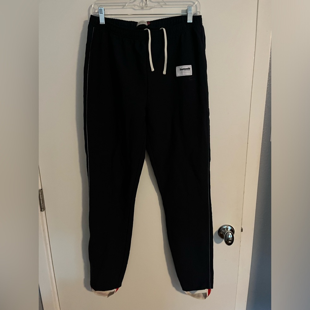 Tracksmith track pants with stirrups L